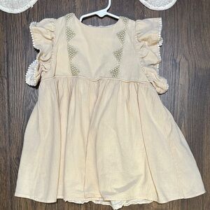 Adorable Cream Kids Dress with Ruffle Sleeves